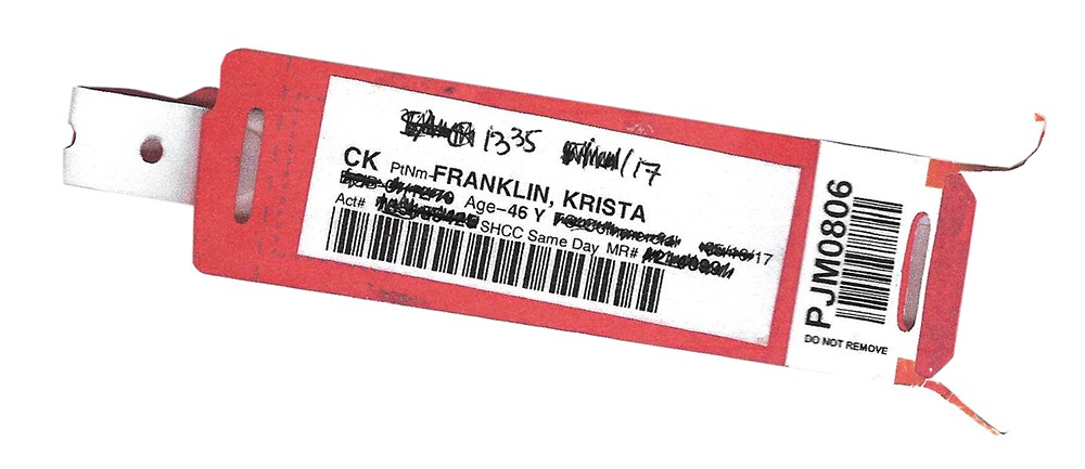Scan of a hospital wristband for patient "Franklin, Krista" with redacted personal information.