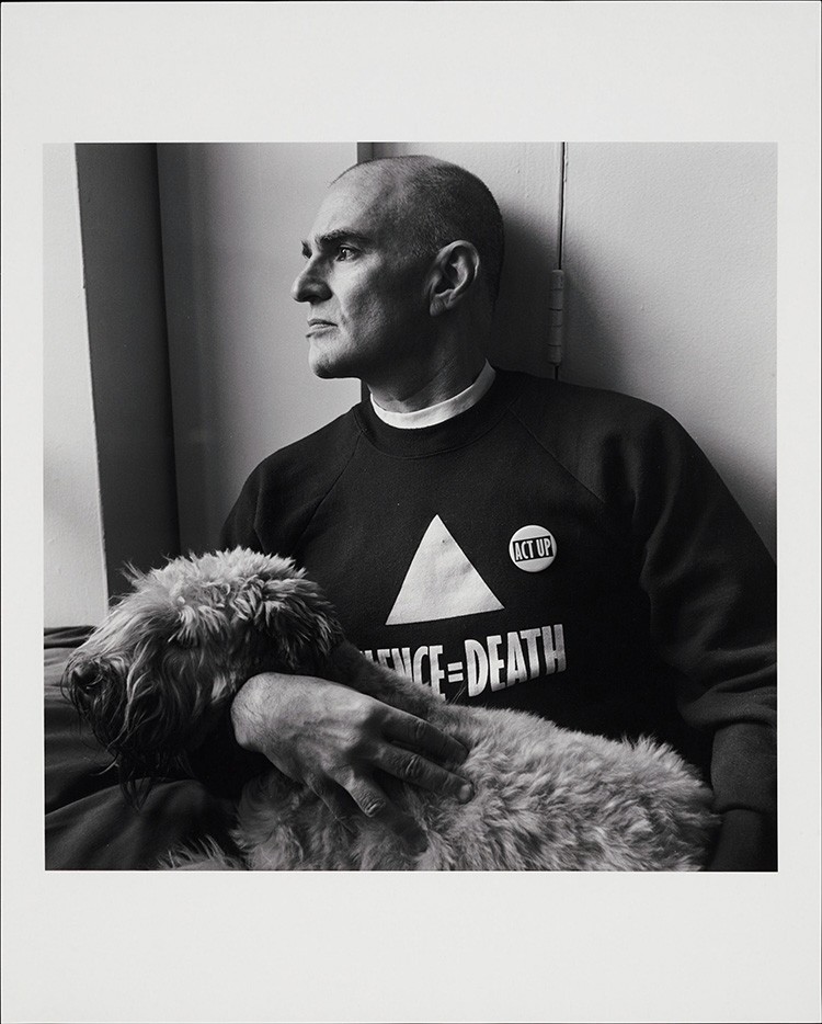 Photo of Larry Kramer and his dog.