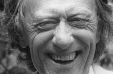 Tight cropped black and white headshot of poet Edward Dorn.