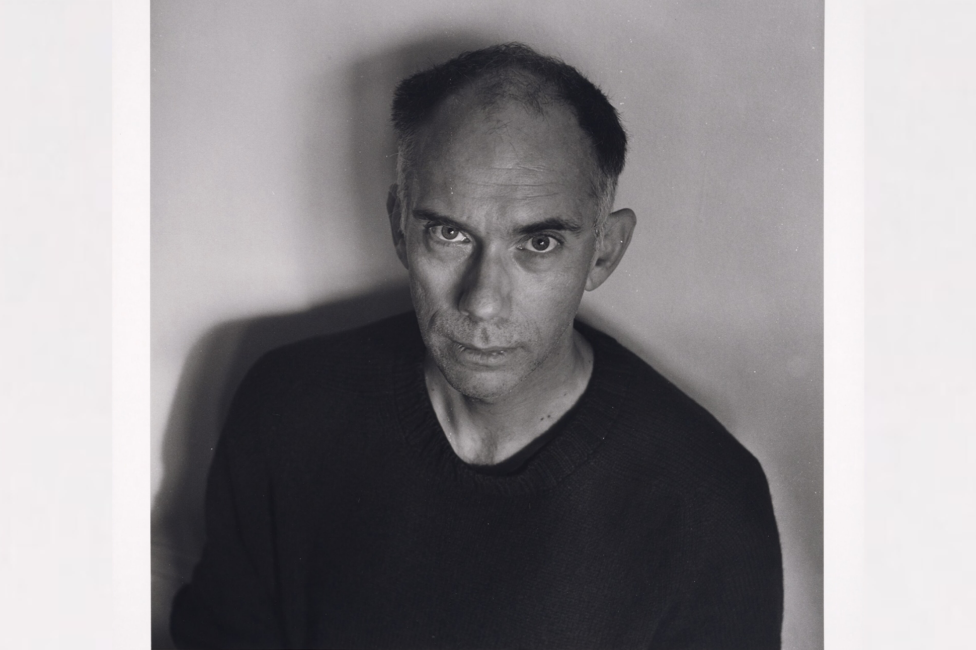 Black-and-white portrait of Bruce Boone.